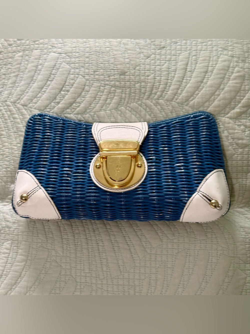 Hype, Blue Vintage Woven Rattan Clutch, white leather Trim, twist lock closure.